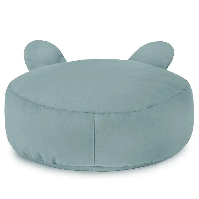 Pufa pod nogi pluszowa do salonu: co sprawdzić przed zakupem.