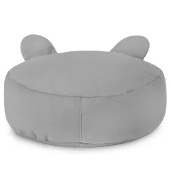 Pufa pod nogi pluszowa do salonu: co sprawdzić przed zakupem.