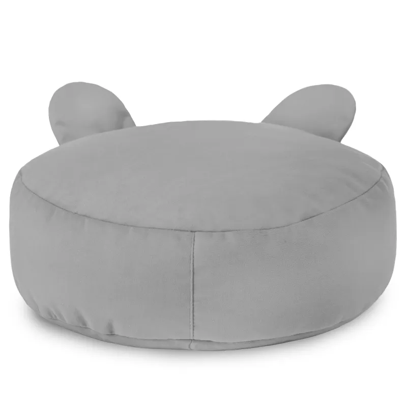 Pufa pod nogi pluszowa do salonu: co sprawdzić przed zakupem.