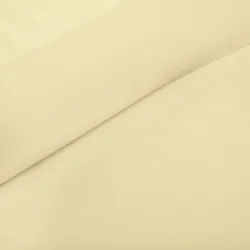 Biała pufa pod nogi z ekoskóry do salonu: praktyczne wskazówki użytkowe.