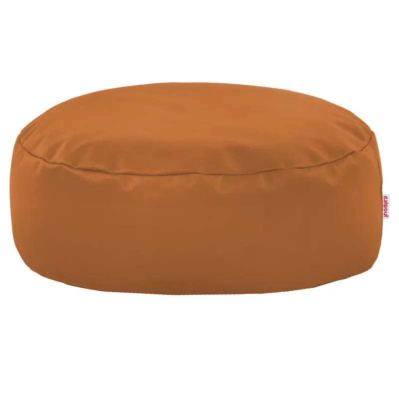 Biała pufa pod nogi z ekoskóry do salonu: praktyczne wskazówki użytkowe.